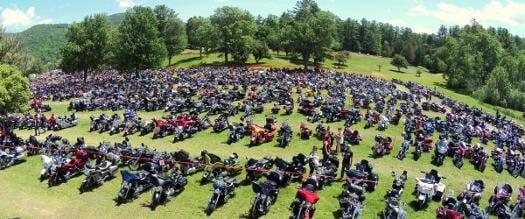 dozens of motorcycles on lawn