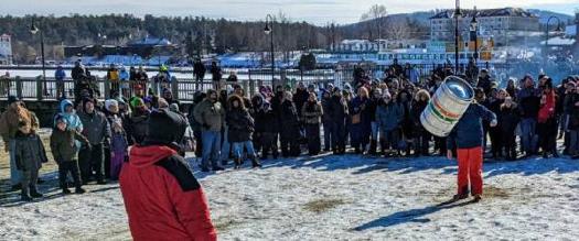 keg toss at lake george winter carnival