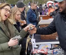woman excited about beer tasting at Barrel Fest in Lake George