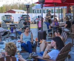 people on winery deck