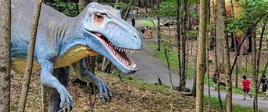 large dinosaur at lake george expedition park