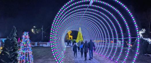 circular holiday light entrance at winter attraction