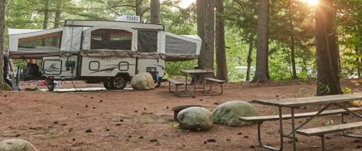 rv campsite with picnic tables