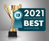 trophy with 2021 capital region's best badge