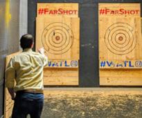 guy axe throwing at far shot albany