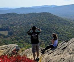 two people at a summit