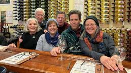 group of people at a wine tasting
