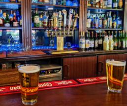 two beers in a cozy bar
