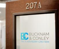 bucknam & conley logo on a door