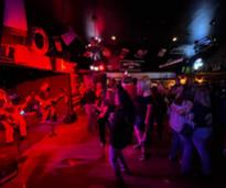 people dancing in a bar