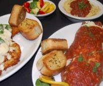 plated Italian food with garlic bread