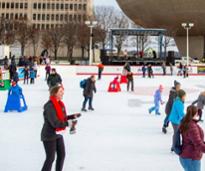 people skating at empire skate plaza