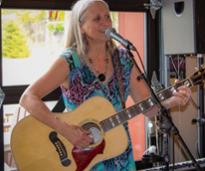 woman plays guitar