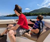 dad and son on boat