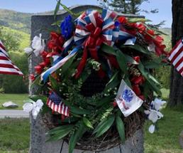 patriotic wreath on gravestone
