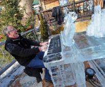 john carr playing an ice piano