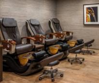 a room with pedicure seats