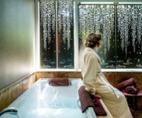 woman by a spa tub