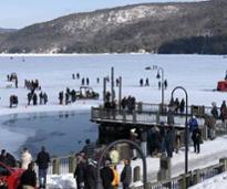 people walking on frozen lake