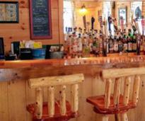 two bar stools at cozy bar