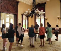 people touring a museum