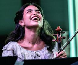 happy woman with violin