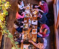 aerial view of people eating at a table