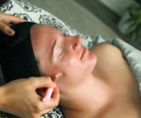 woman enjoying a facial