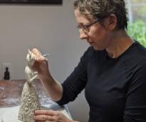 woman sculpting