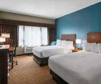 two beds in a hotel room