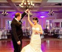 A couple dances their first dance