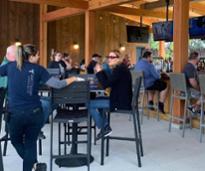 brewpub patio seating area with people