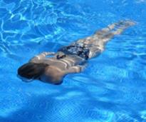 woman swimming in a pool