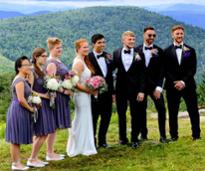 wedding party poses on mountaintop at gore