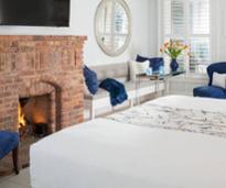 luxurious hotel room with fireplace