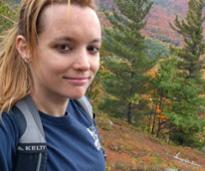 solo hiker selfie on mountain summit in fall
