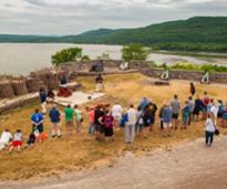people at fort ticonderoga cannon firing