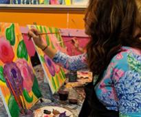 a woman painting