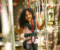 girl on treetop course