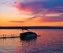 a boat at sunset