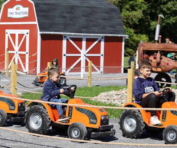 kids riding small tractors