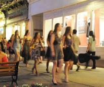 blurred image of women walking on saratoga springs street