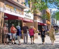 people on saratoga street in front of northshire bookstore