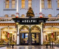 front of Adelphi Hotel decorated for Christmas