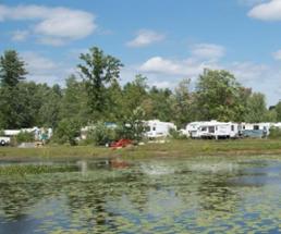 campers on a pond