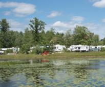 campers by a pond