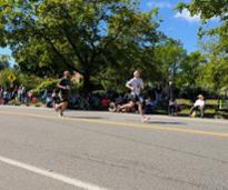 two runners on a road