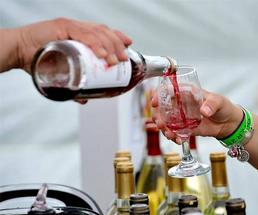 Wine being poured at the Adirondack Wine and Food Festival