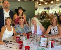 people at a Travers racing event