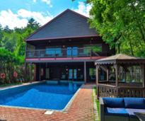a vacation home with an outdoor pool